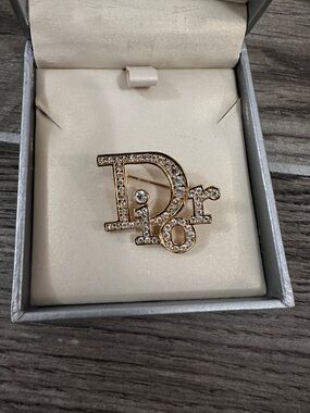 Dior Crystal Logo Pin in Silver with Clear Stones